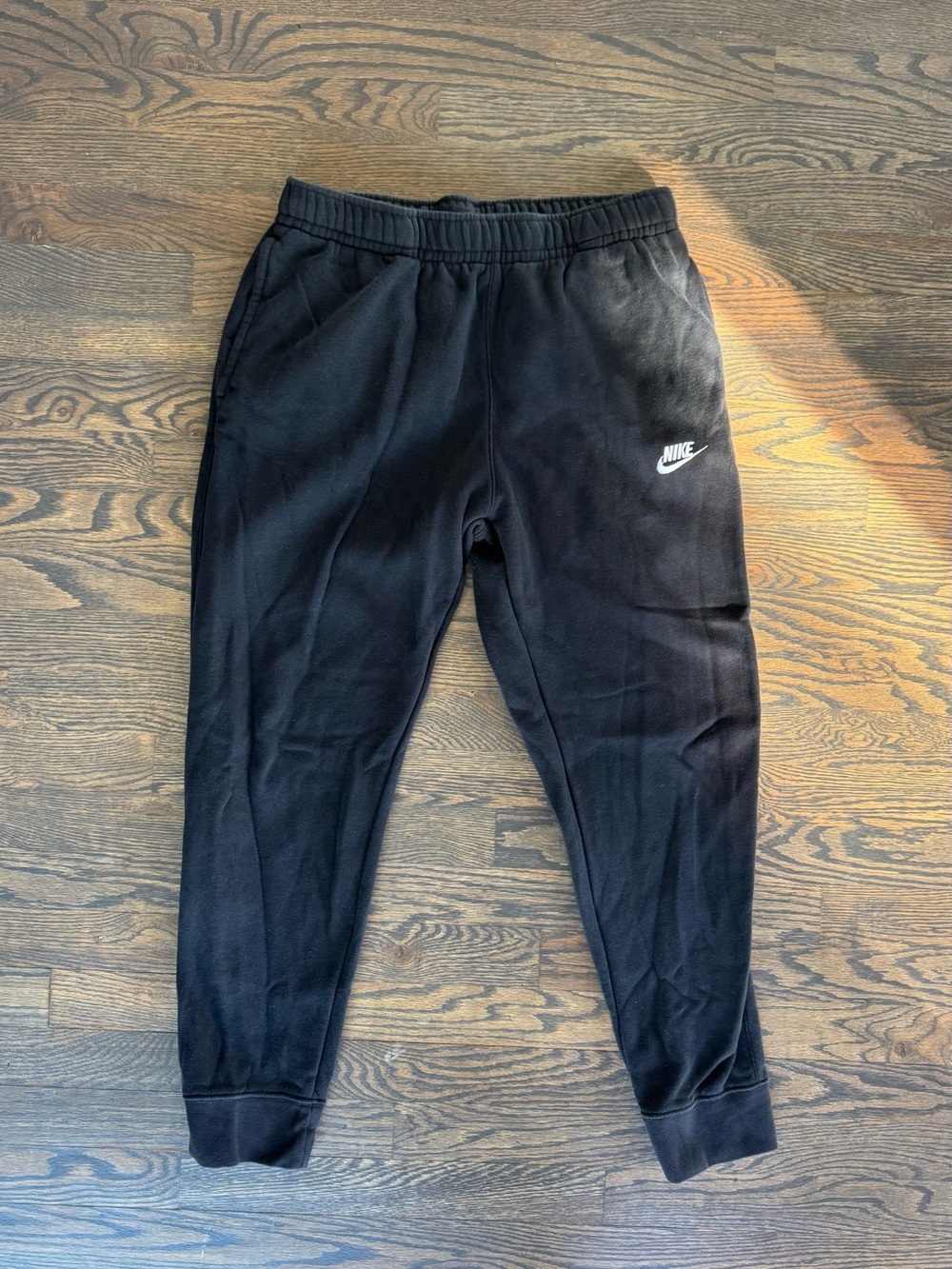 Nike Black Jogger Pants with White Swoosh Logo